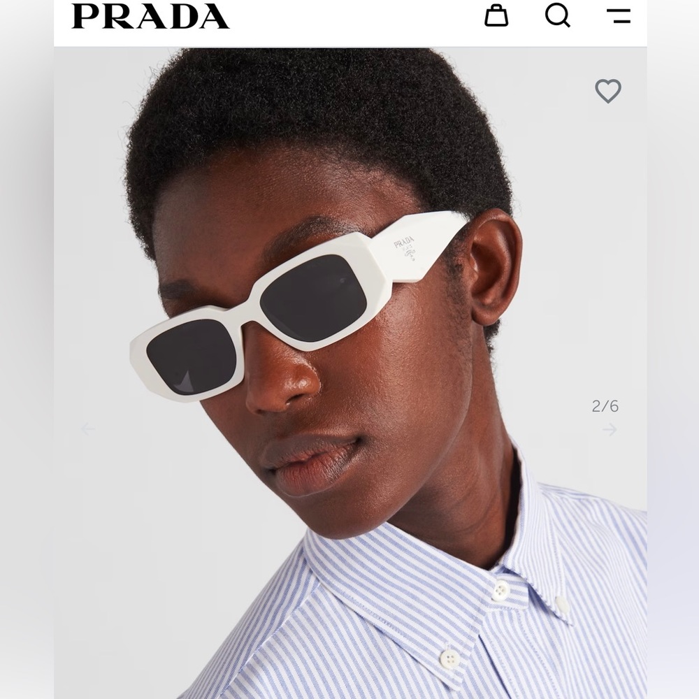 Prada white symbole sunglasses with case. Excellent condition